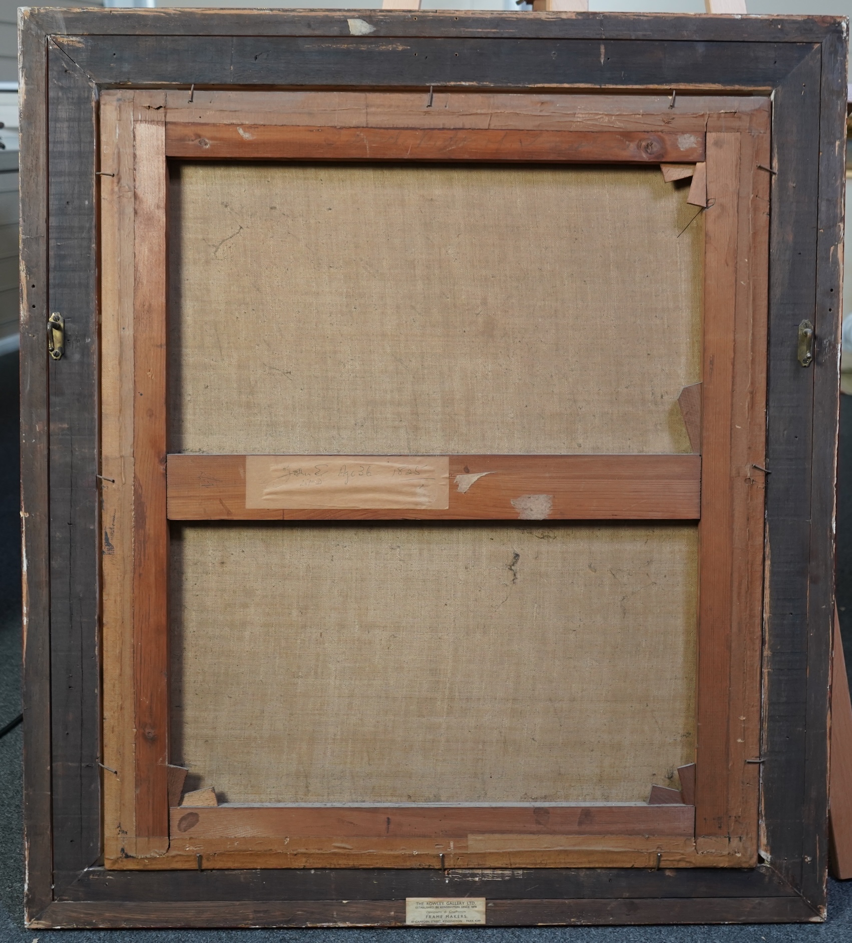 English School, 19th century, A portrait of a scholarly gentleman holding a book